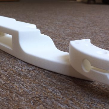 Asymmetric 'RaptoR' style stock for thumb-up shooting
